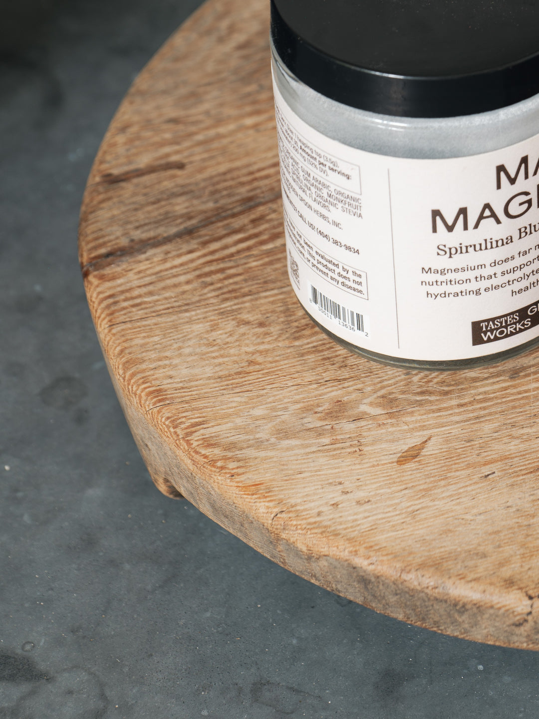 a jar of magnesium on a wooden table